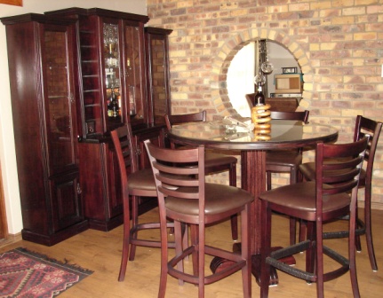 DEWALD LIQUOR CABINET & COCKTAIL TABLE WITH MICHAEL CHAIRS