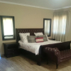SLEIGH-BED-Leather-Upholstered